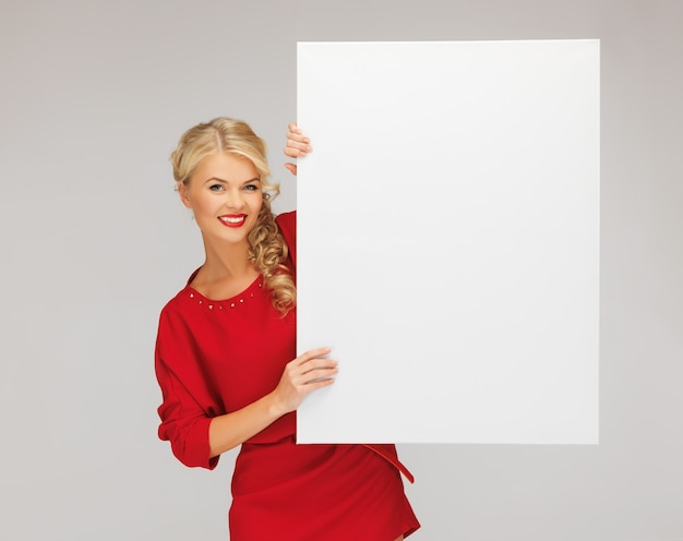 picture of lovely woman in red dress with blank board