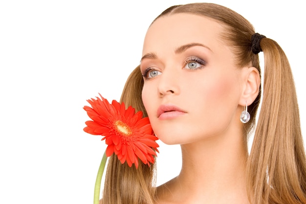 picture of lovely woman in towel with red flower