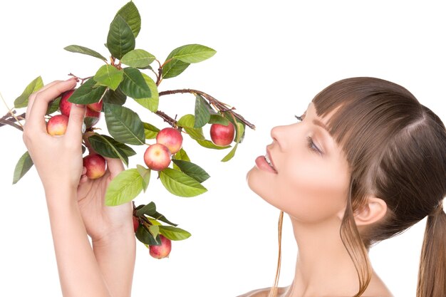 picture of lovely woman with apple twig