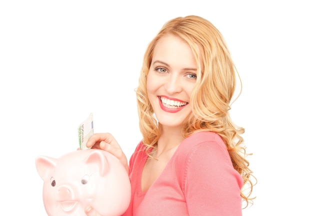 picture of lovely woman with piggy bank and money