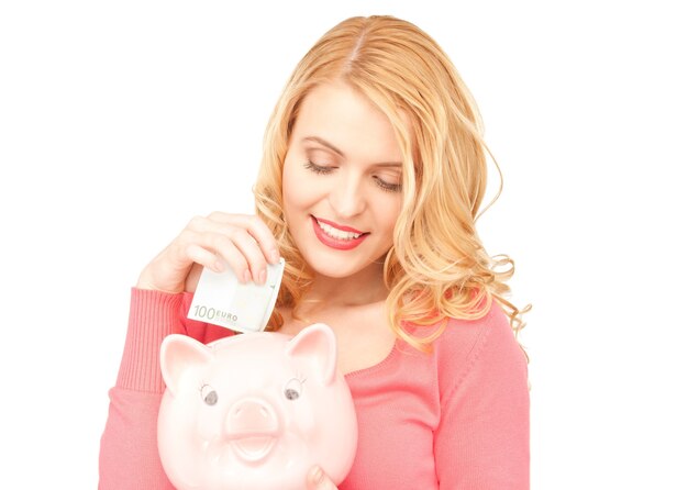 picture of lovely woman with piggy bank and money