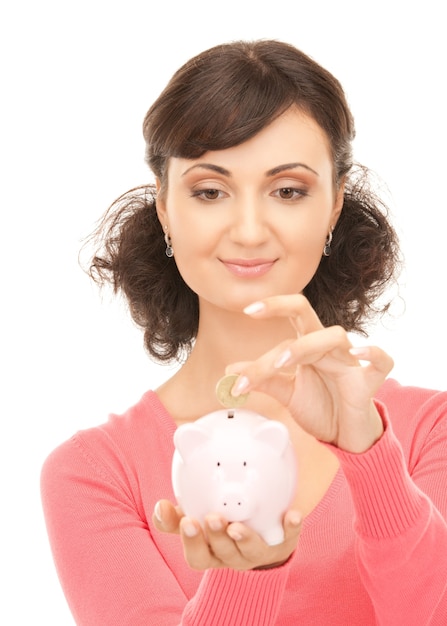 picture of lovely woman with piggy bank and money