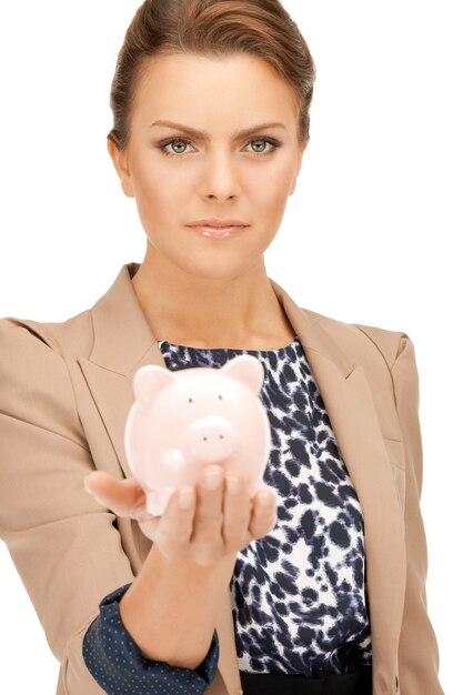 picture of lovely woman with piggy bank