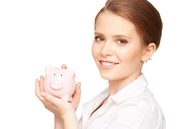 picture of lovely woman with piggy bank