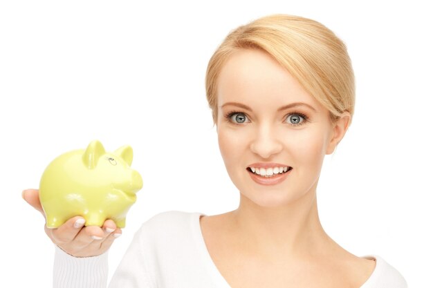 picture of lovely woman with piggy bank