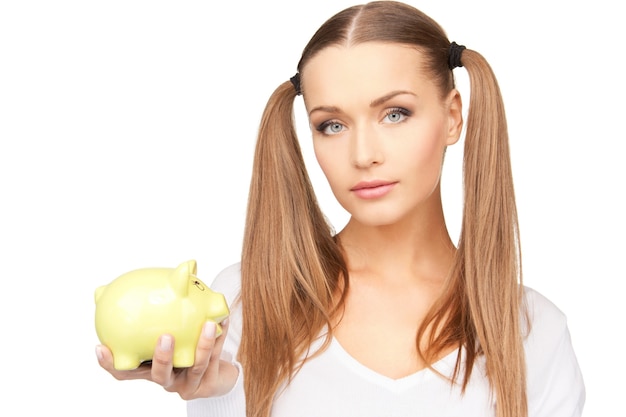 picture of lovely woman with piggy bank