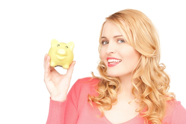 picture of lovely woman with piggy bank