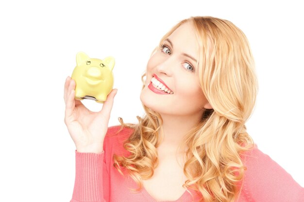 picture of lovely woman with piggy bank