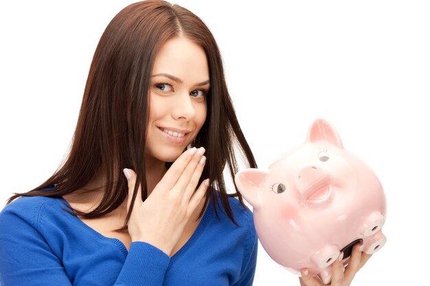 picture of lovely woman with piggy bank