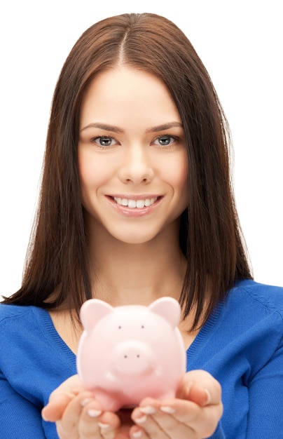 picture of lovely woman with piggy bank.