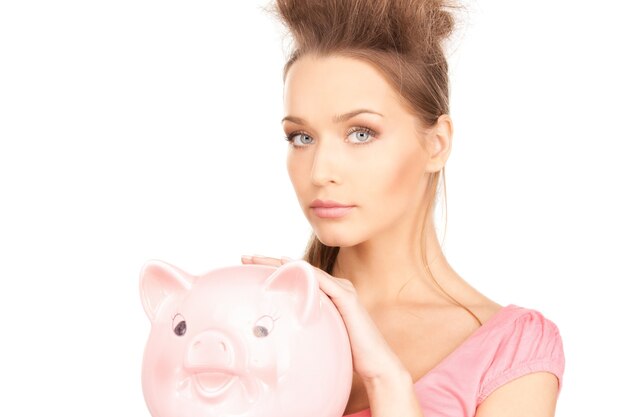 picture of lovely woman with piggy bank