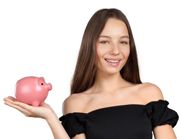 Picture of lovely woman with piggy bank