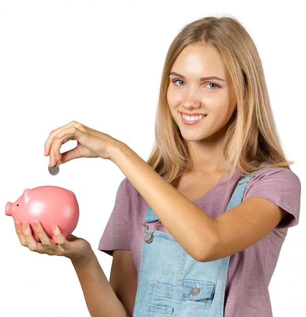 Picture of lovely woman with piggy bank