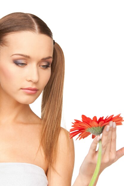 picture of lovely woman with red flower