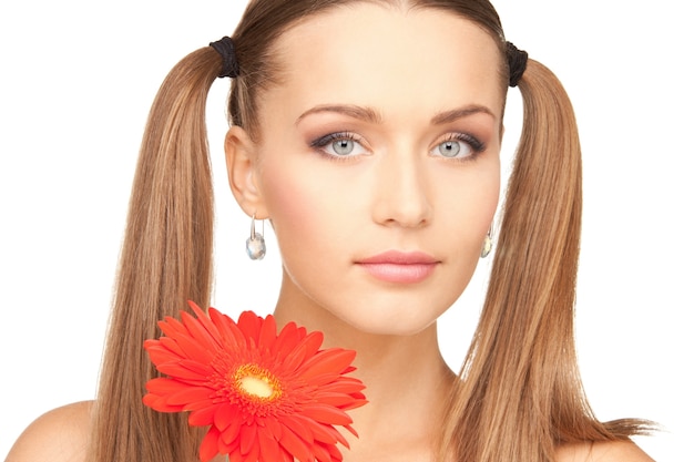 picture of lovely woman with red flower