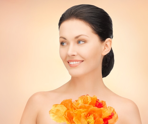 picture of lovely woman with red flowers