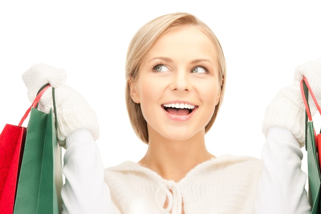 Photo picture of lovely woman with shopping bags