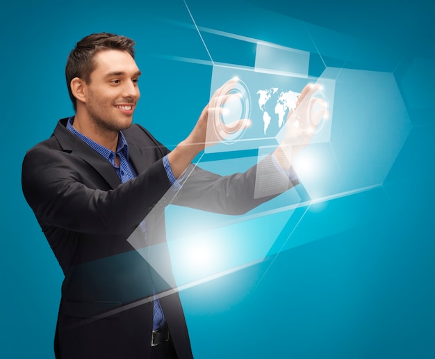 picture of man in suit working with virtual screens