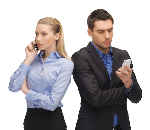 picture of man and woman with cell phones