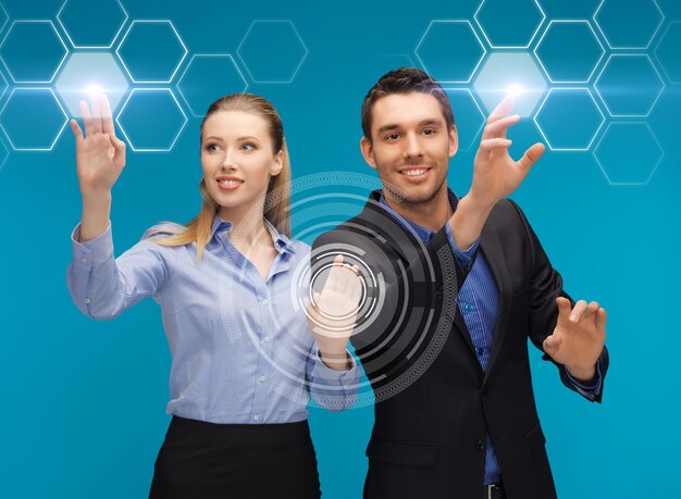 picture of man and woman working with virtual screen