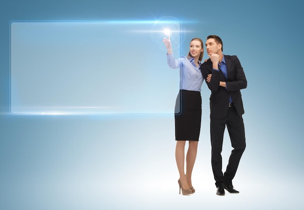 picture of man and woman working with virtual screen