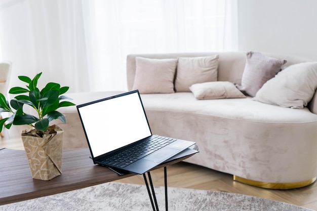 Photo picture of modern personal computer with blank white copy space screen mock up of workplace