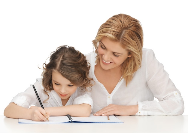 picture of mother and daughter doing home work