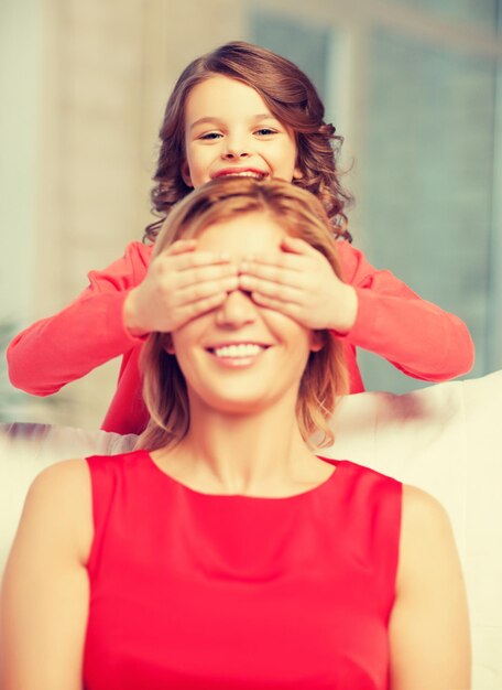 picture of mother and daughter making a joke