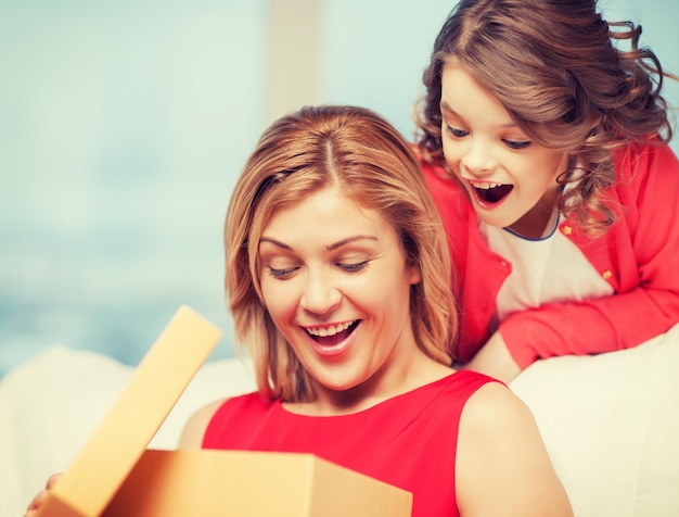 picture of mother and daughter with box