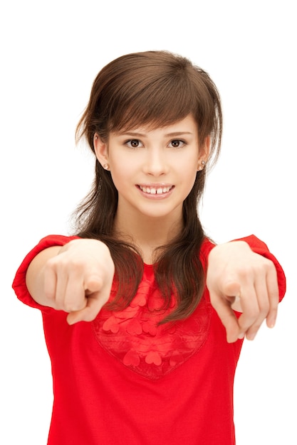 Фото Изображение девочки подростка указывая пальцем