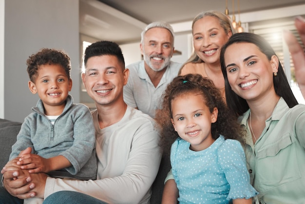 A picture perfect family Shot of a family taking a selfie together at home