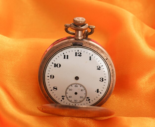 picture of a Pocket watch vintage on fabric background