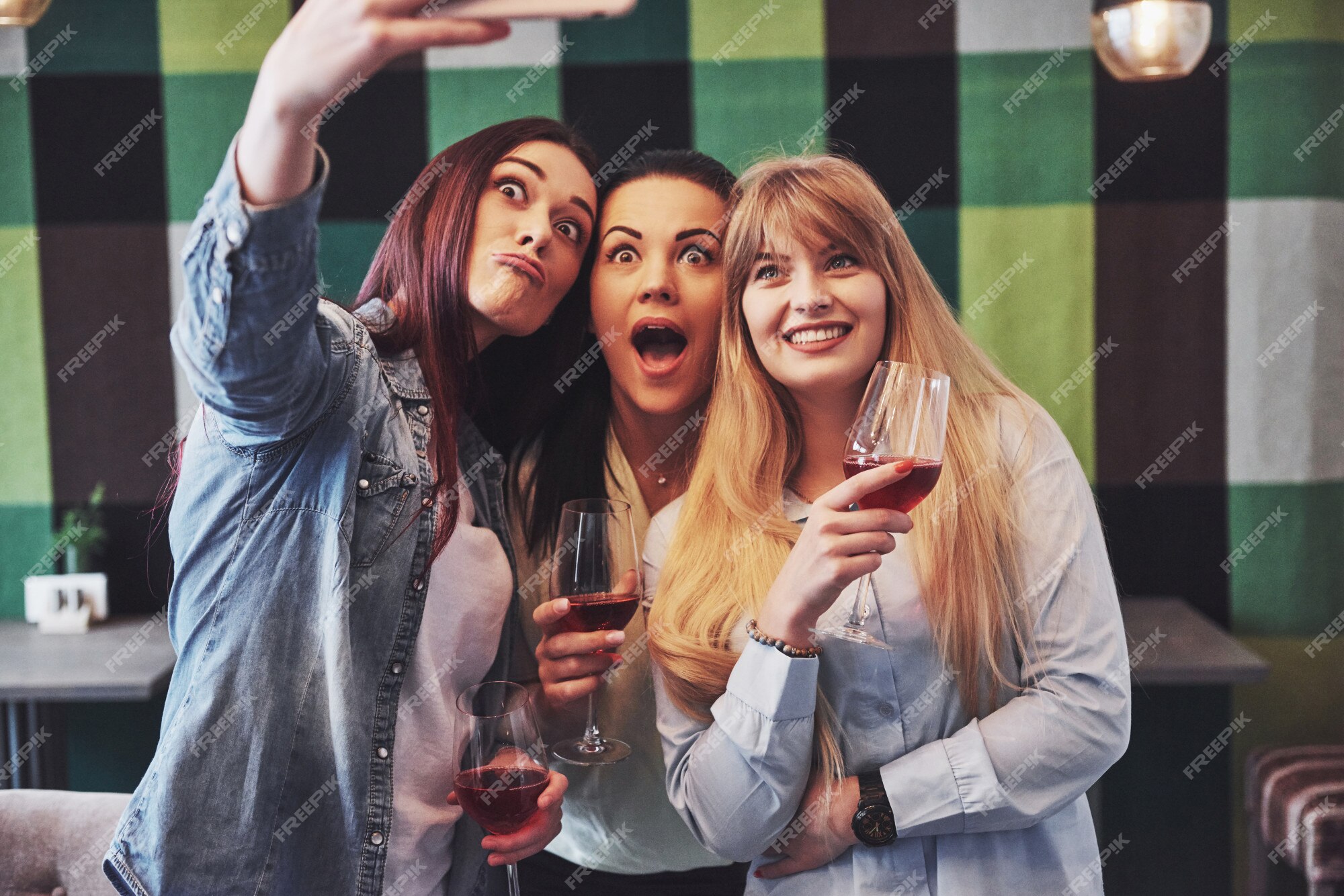 Premium Photo | Picture presenting happy group of friends with red wine ...