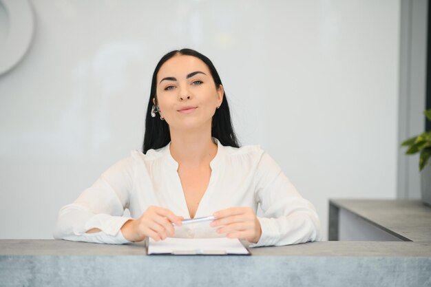 Picture of pretty receptionist at work