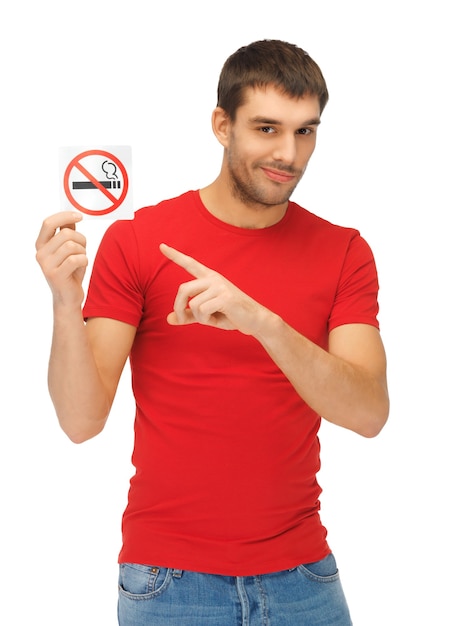 picture of serious man in red shirt with no smoking sign.