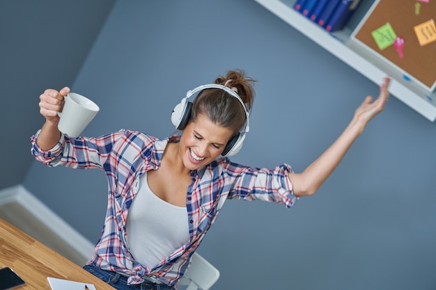 Picture showing successful female student learning at home