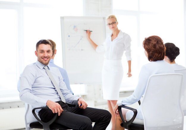 picture of smiling businessman on business meeting in office