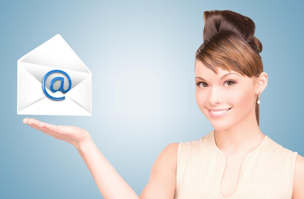 picture of smiling woman showing virtual envelope