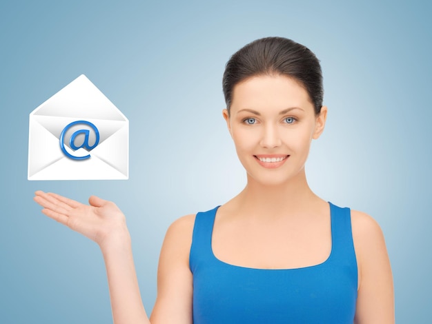 picture of smiling woman showing virtual envelope