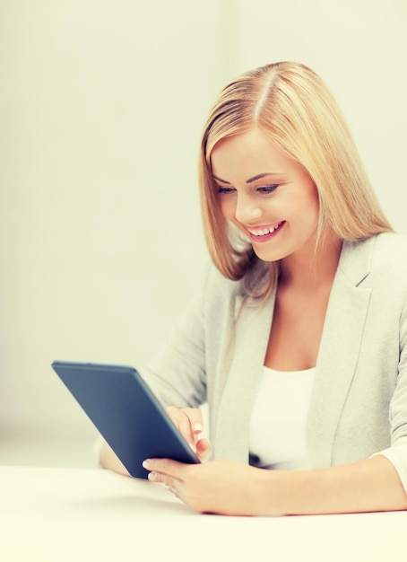 picture of smiling woman with tablet pc