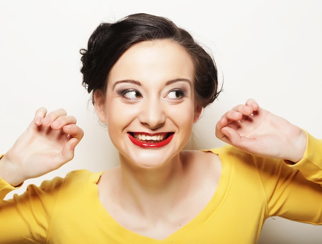 Picture of surprised woman face over white