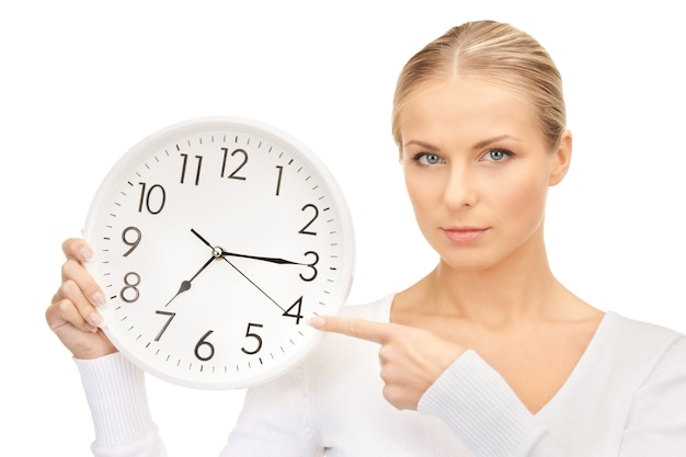 picture of woman holding big clock over white