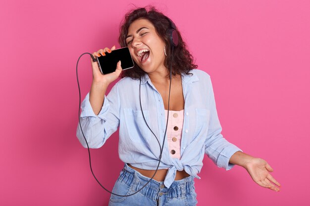 Picture of woman listening to music on headphones