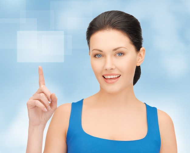 picture of woman pointing her finger on virtual screen