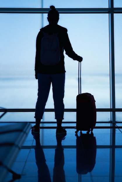 Picture of woman waiting for flight at airport