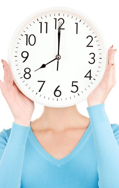 picture of woman with big clock covering face