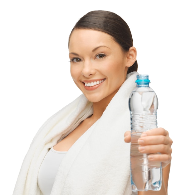 picture of woman with bottle of water and towel