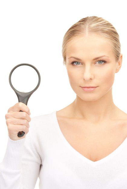 Picture of woman with magnifying glass over white