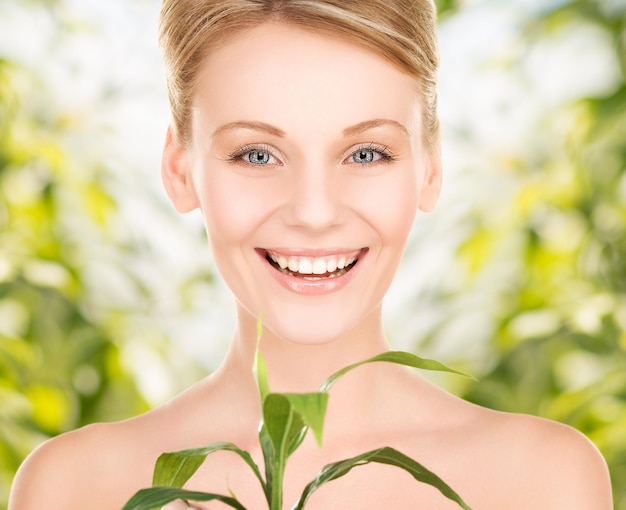 picture of woman with sprout over green background