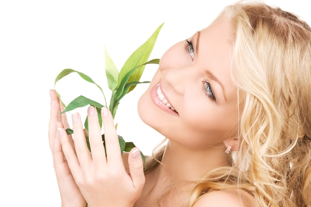 picture of woman with sprout over white